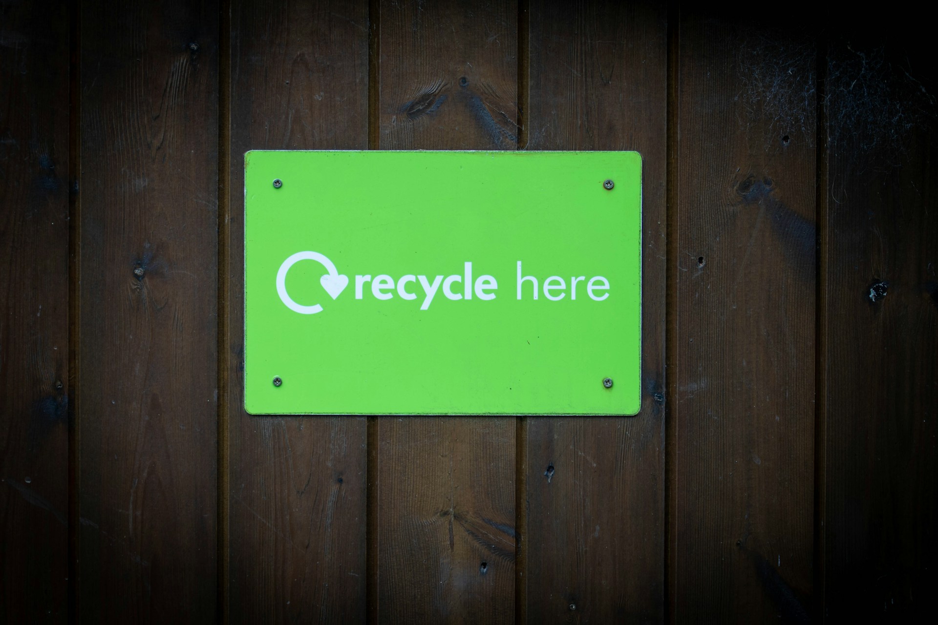 Recycle here green sign