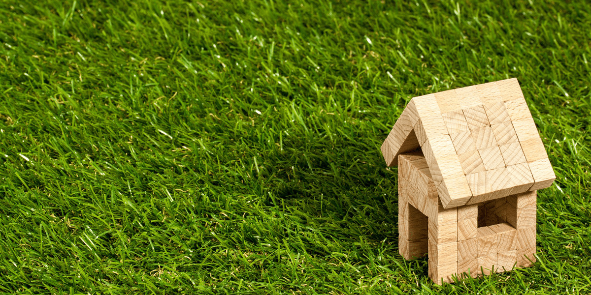 Small wooden house made from blocks