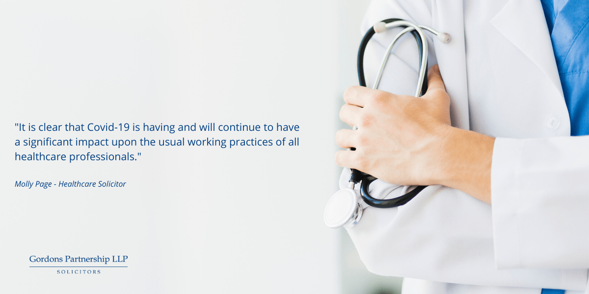 Doctor holding a stethoscope.