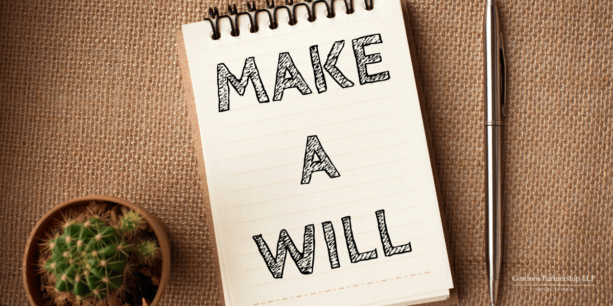 "Make a will" written on a note pad