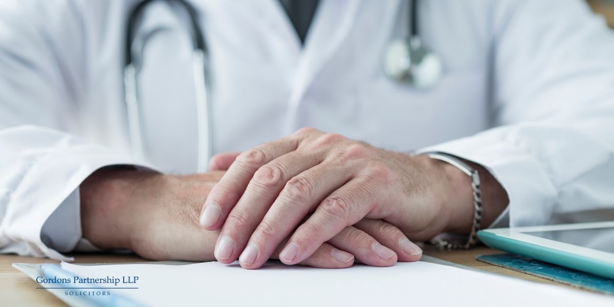 Doctor sitting at a table