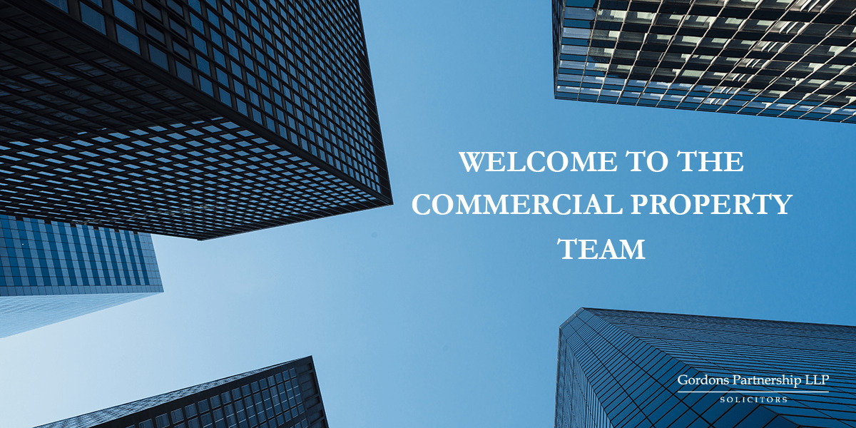 High-rise buildings and "Welcome to the commercial property team"