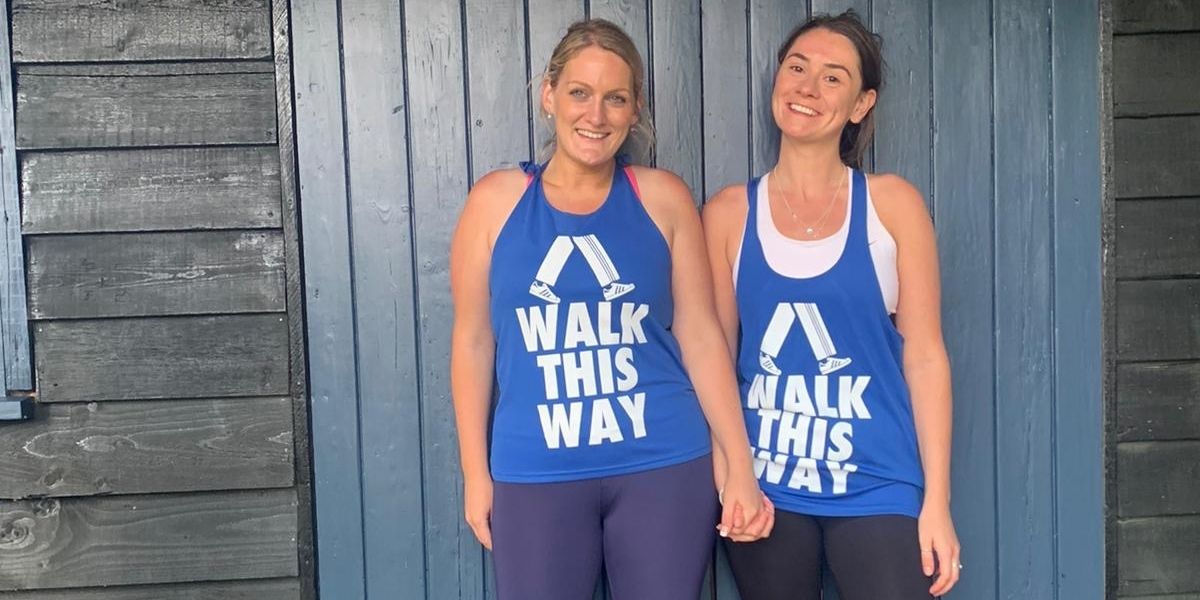 Two sisters wearing running clothes