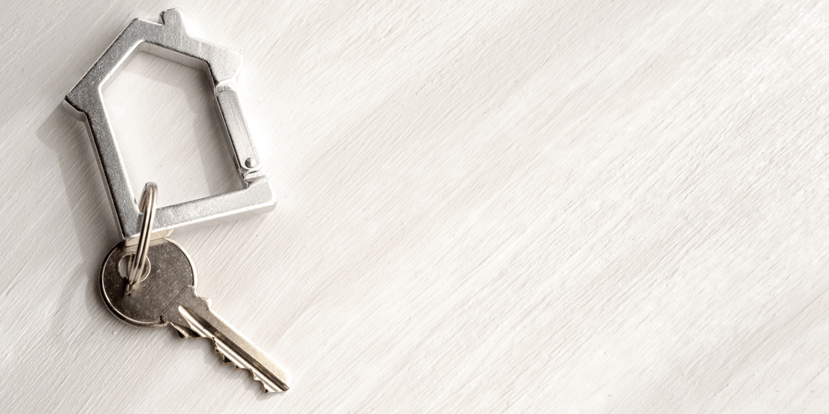Key with a house attached