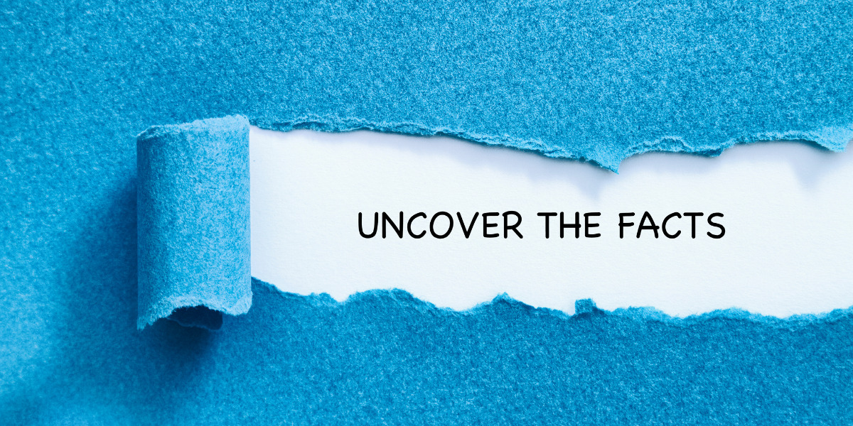 Paper torn to reveal phrase uncover the facts