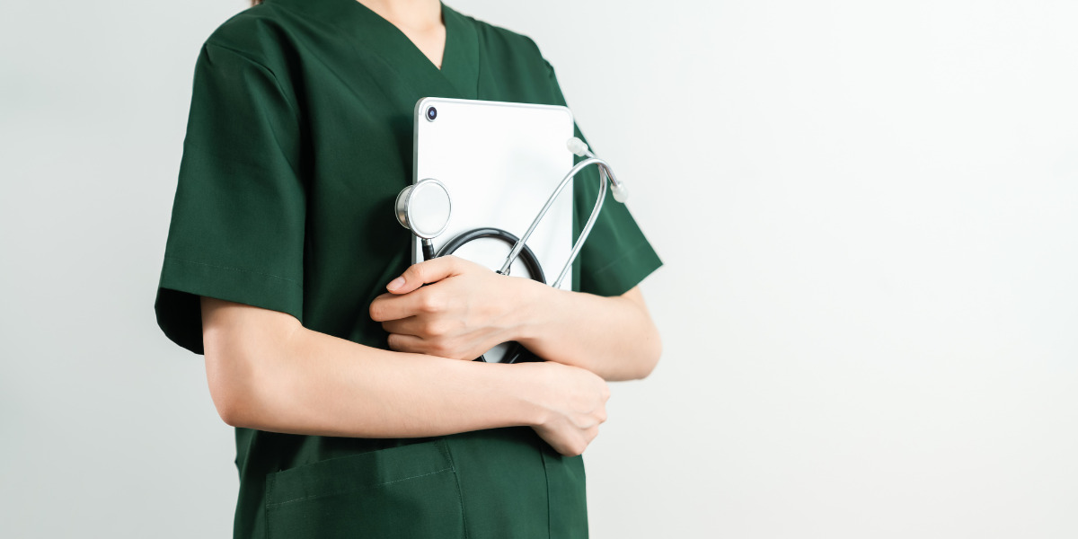 Nurse holding equipment.