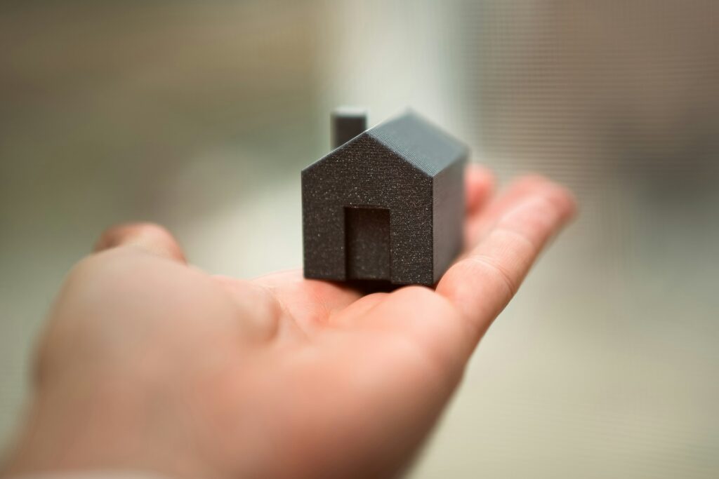 Small house in the palm of hand